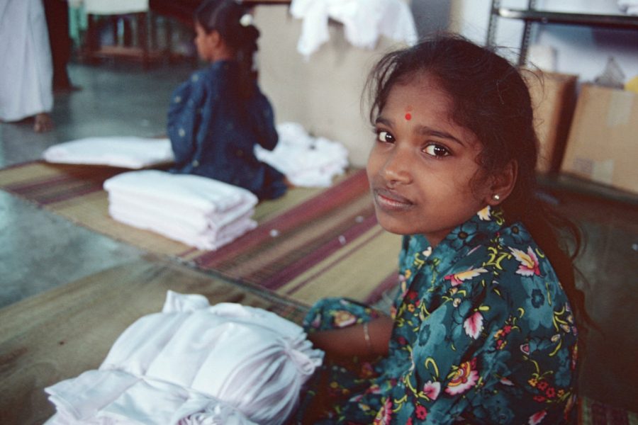 Indian youth working in textile mill