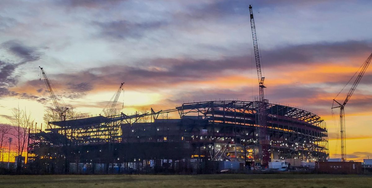 A New Era . The construction site of the new Buffalo Bills stadium in Orchard Park, New York during a beautiful and vibrant morning sunrise. The picture captures all the machinery and construction equipment being used as well as the progress of the stadium. The new stadium represents a new era for Buffalo, its sports teams, and its people. With the stadium being built, and the sunrise starting a new day; the picture shows that things are changing in Buffalo when it comes to the sporting world. The Bills are finally good again, the Sabres are getting there, and the Bandits have dominated the professional lacrosse world for many years. Buffalo sports are rebuilding and becoming great again, and the new Bills stadiums represents that.

