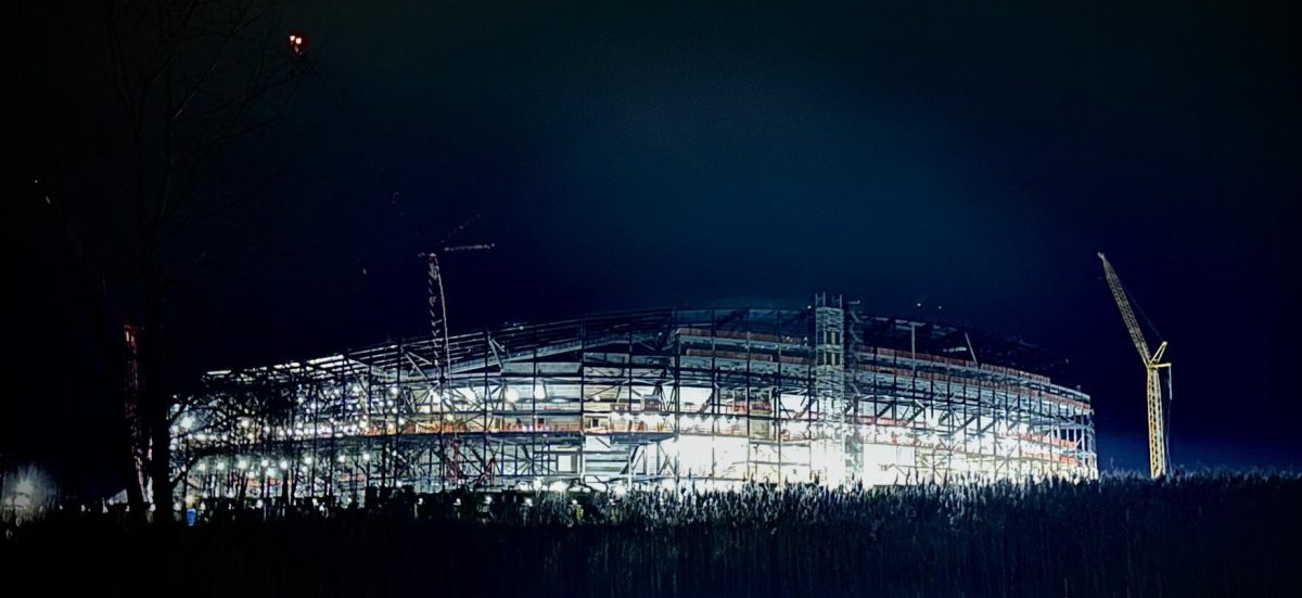 Hope for victory. The striking features of the new Bills stadium being built in Orchard Park are captured. There is brilliant lighting across the sky which forms a perfect compliment to the New Bills stadium's architecture. It seems that there's some type of illumination inside the stadium. As a result, it appears as if the whole structure embodies stimulation from fans and the incredible matches that are soon to occur there. The light blue illumination of the House of Billsman is automatically linked to some secure sign--not to mention hope for victory. 
