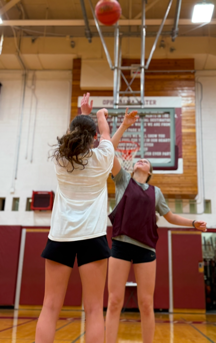 Winner takes all. Caroline Brown and Lainey Babich playing at OP Girls Varsity Basketball tryouts in 1-on-1 competition. An exciting week of basketball tryouts for the varsity girls team kicked off the season. The girls worked hard for an official spot on the team, fighting each other for a starting position. Caroline Brown, a sophomore with lots of potential, was pulled up for playoffs last season, and is playing in her first full varsity season this year. Big things are expected as she goes up against the best players and succeeds.


