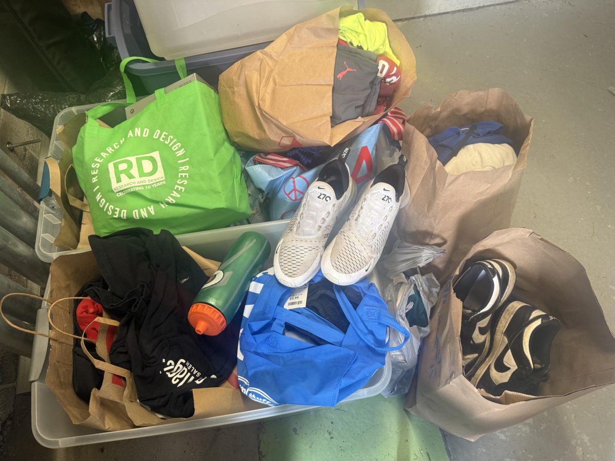 Some of the donations of athletic wear collected by the girls' varsity swim & dive and soccer teams. 